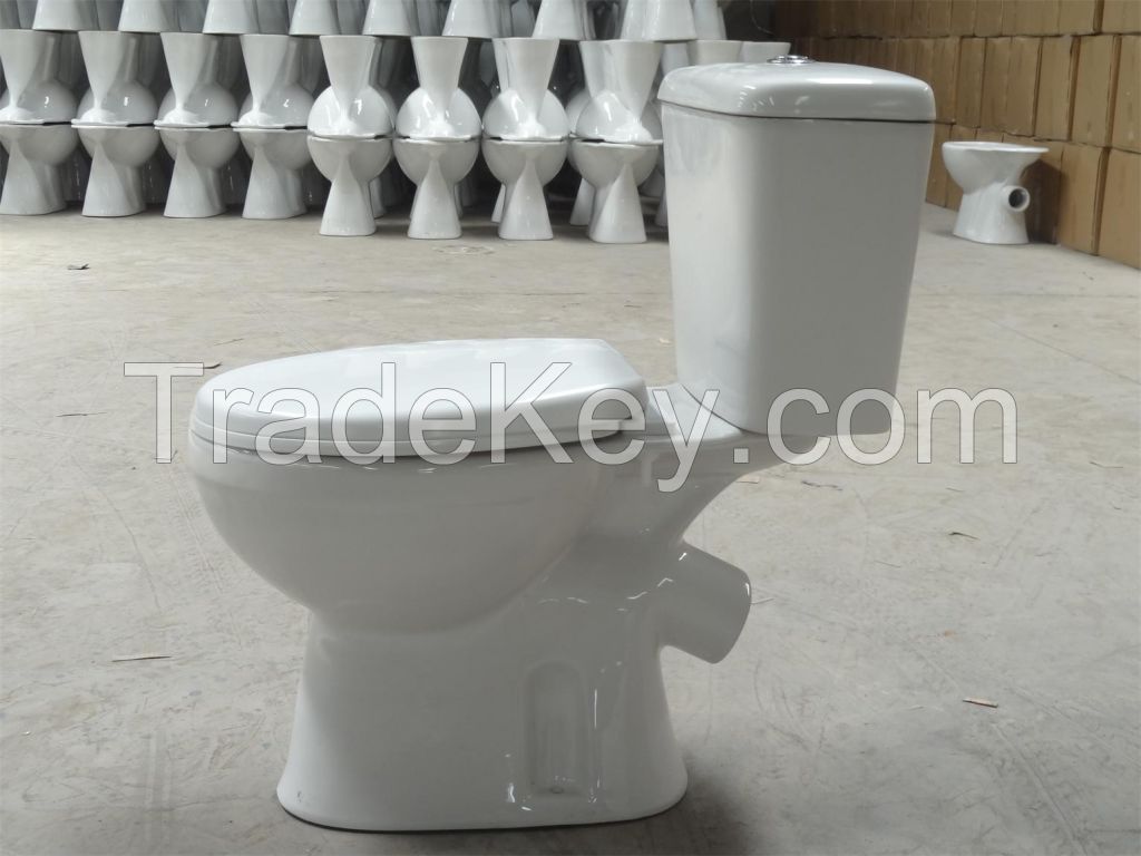                        Two piece toilet X trap