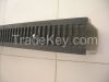 Polymer concrete channel with casting iron grating