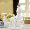 Goat and Shoeshaped Gold Ingot Porcelain Figurines With Gold Outline