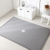 100% cotton rug with silver colored little star