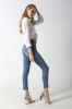Woman's slim denim jeans with front full rhinestone