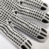 Bleach cotton/polyester string knit.Black pvc dots both sides.DDsafety 77+countries low-cost manufacturer gloves.CE/ISO standards work gloves