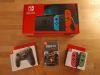 Nintendo Switch Bundle-Console, Extra Controllers, MicroSD Card, Resident Evi