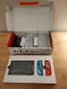 Nintendo Switch Bundle-Console, Extra Controllers, MicroSD Card, Resident Evi