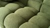Green croutons in a row sofa