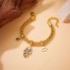 DaDa Fashion Europe America personality vintage, high-grade gold-plated stainless steel, dripping oil, Fatima hand, eye pendant jewelry bracelet