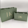 Custom Color UV Gold Foil Printed Art Paper Bag with Embossed Design for Clothing and Cosmetic Use Competitive Price