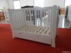 Sleigh cot with drawer