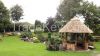 Pavilion. Gazebo with reed roof. Thatched gazebo.