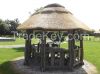 Pavilion. Gazebo with reed roof. Thatched gazebo.