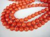 Coral strands with semi precious stone