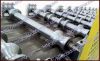 Trapezoidal roof panel roll forming machine