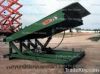 Stationary hydraulic yard ramp/leveler