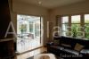Sliding frameless glazing system