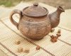 Ceramic tea pot made of red clay.