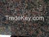 Flesh Red coloured rough granite blocks and processed granite tiles and slabs of required sizes.