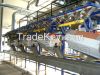 Peeling machines, confectionary systems, vegetable processing systems