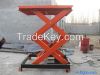 Safe and durable Stationary scissor lift for warehouse