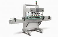 Automatic linear capping machine