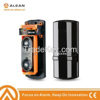 Twin photoelectric infrared beam motion detector