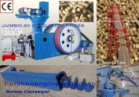 Sawdust briquette press