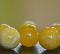 AMBER BEADS CUT FROM ONE STONE