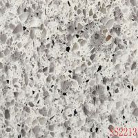 Quartz stones with slightly gray background and dark gray patches