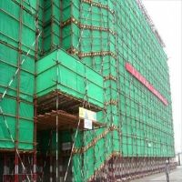 Construction Safety Net Scaffold Net debris control netting, used to enclose scaffolding around a vertical building tower structure