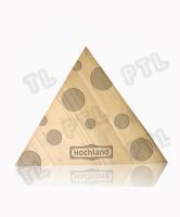 triangular cheese chopping board with pattern on surface