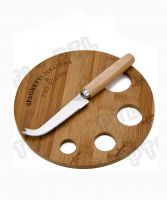 wood-handled cheese knife with rounded bamboo cutting board