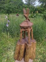 Wooden garden sculpture