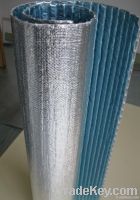 Reflective bubble insulation material for buildings