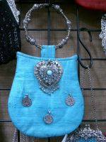 blue hand bag with embroidery