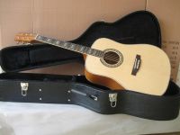 All solid wood acoustic guitar