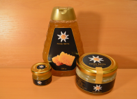 High quality honey in barrels and glass jars