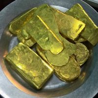 Gold Dore Bars and Rough uncut Diamonds