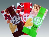 Egg roll, jam-filled inflated snack packaging centre-seal side gusset pouch