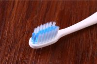 Concave toothbrush