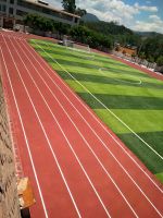 Synthetic all-weather running track surface sandwich system hybrid system non-porous impermeable