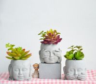 tabletop buddha planter flower pot with plastic succulents