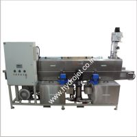 Conveyorized component cleaning machine