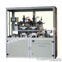 Full automatic embossing and tipping machine