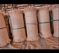 Lounge chairs, rattan table, tissue box