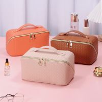 Large Capacity PU Leather Weave Cosmetic Bag Women Portable Travel Makeup Bag With Handle and Divider Flat Lay