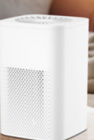 Portable desktop air purifier for household use