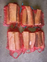 Firewood in plastic nets | Wholesale | Worldwide delivery | Ultima