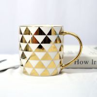 Gold Handle Coffee Mug With Geometric Design