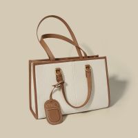Commuting high-capacity shoulder bag, niche new fashionable retro color block handbag, textured top layer cowhide tote bag