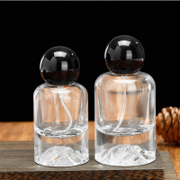 Round Perfume Bottle With Metal Sprayer Pump Cap