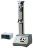 Tensile and compression testing machine